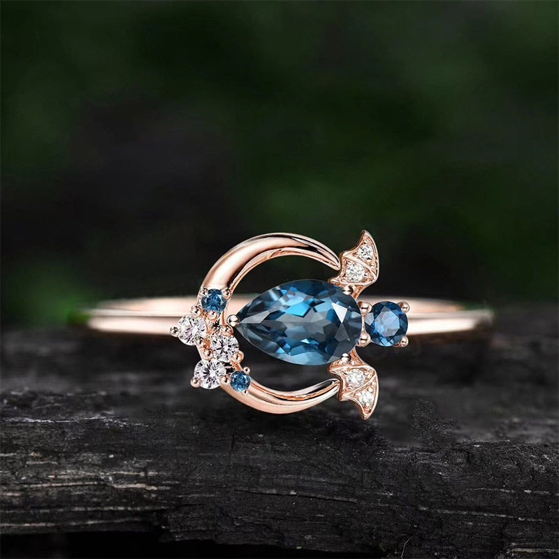 Olivenorma "Keep Close to Joy" - Unique Bat Cut Blue Topaz Ring