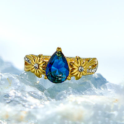 Olivenorma Blue Topaz with Floral Zircon Accents Ring