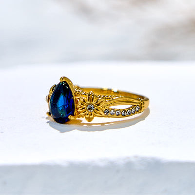 Olivenorma Blue Topaz with Floral Zircon Accents Ring