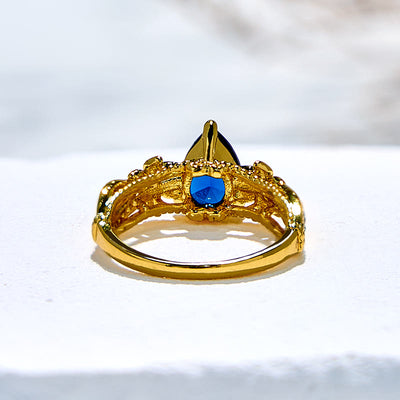 Olivenorma Blue Topaz with Floral Zircon Accents Ring