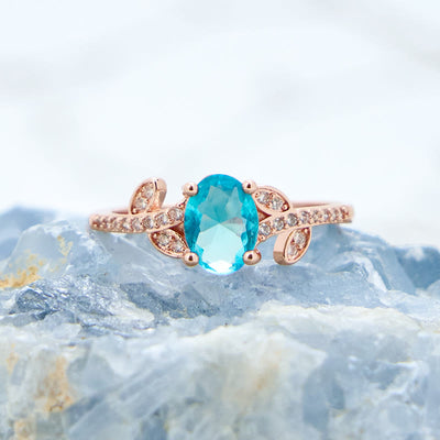 Olivenorma Oval Cut Blue Topaz Wrapped Leaf Ring