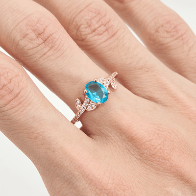 Olivenorma Oval Cut Blue Topaz Wrapped Leaf Ring