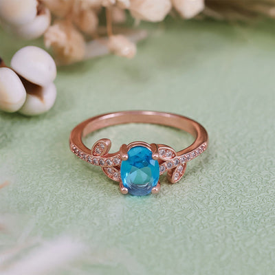 Olivenorma Oval Cut Blue Topaz Wrapped Leaf Ring