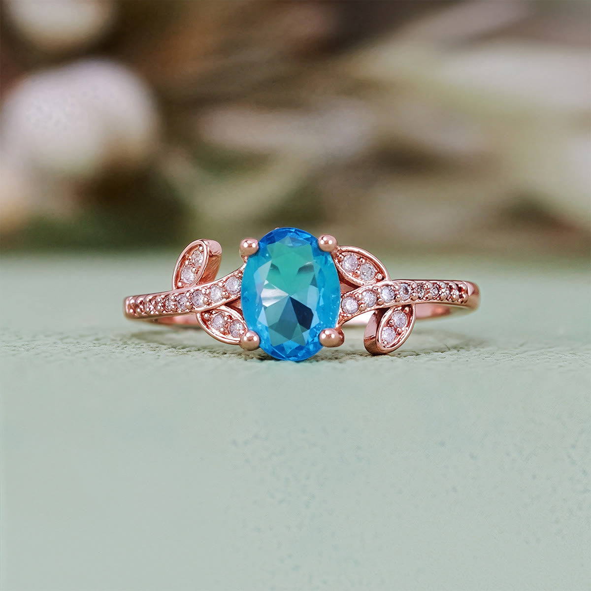 Olivenorma Oval Cut Blue Topaz Wrapped Leaf Ring