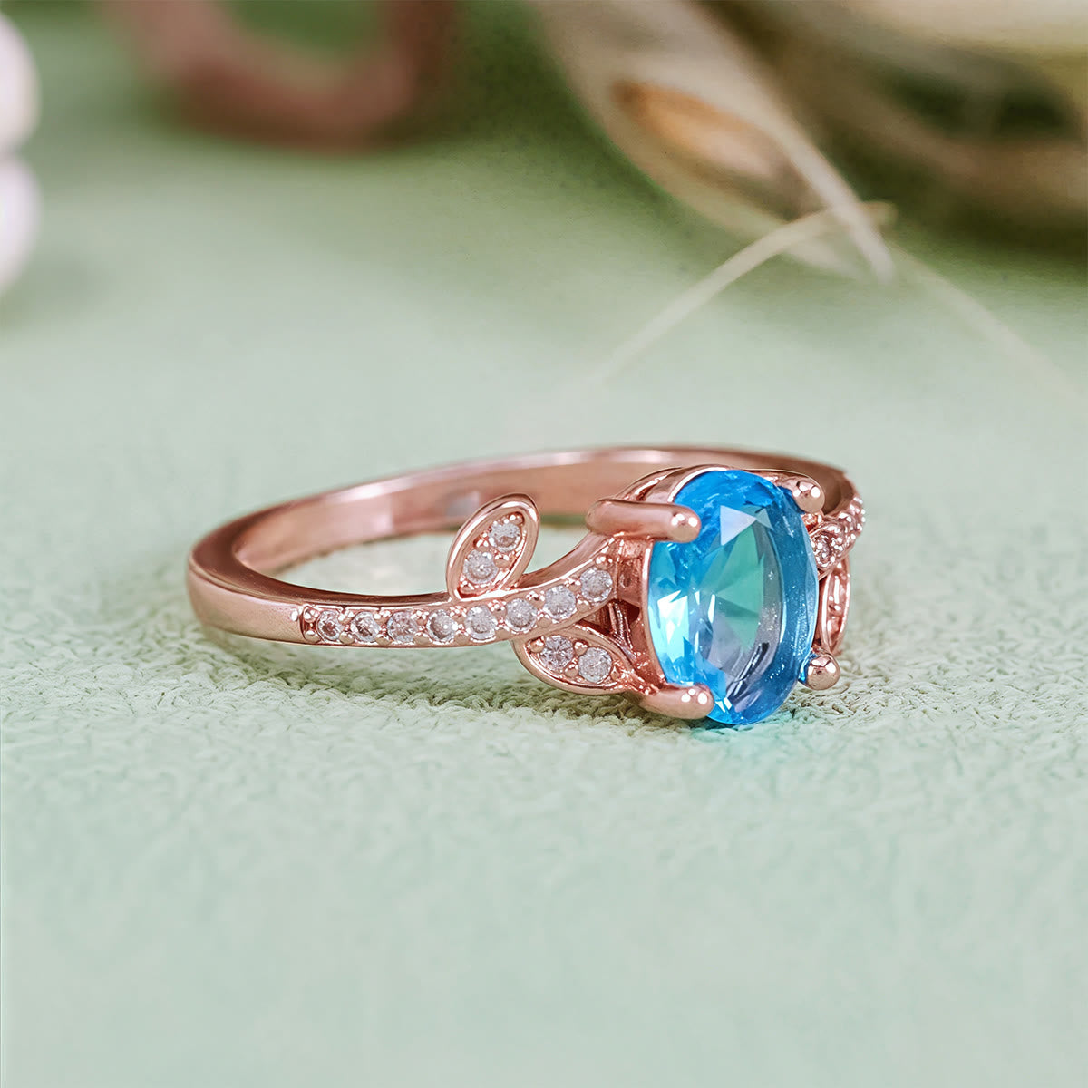 Olivenorma Oval Cut Blue Topaz Wrapped Leaf Ring