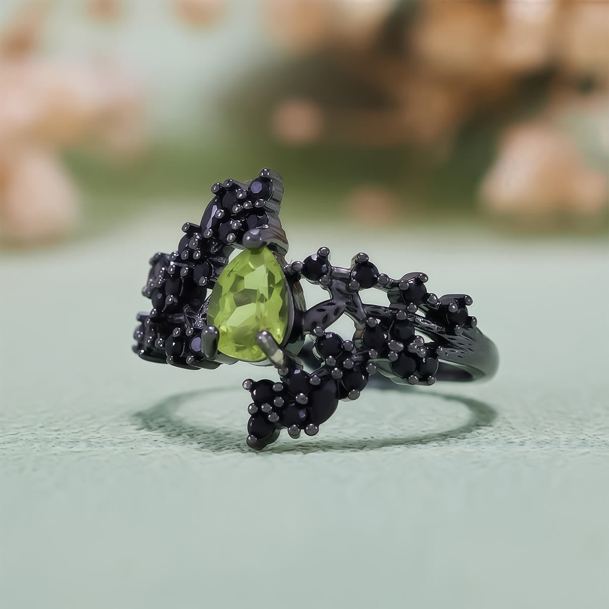 Olivenorma Pear Cut Peridot Obsidian Leaf Vine Ring