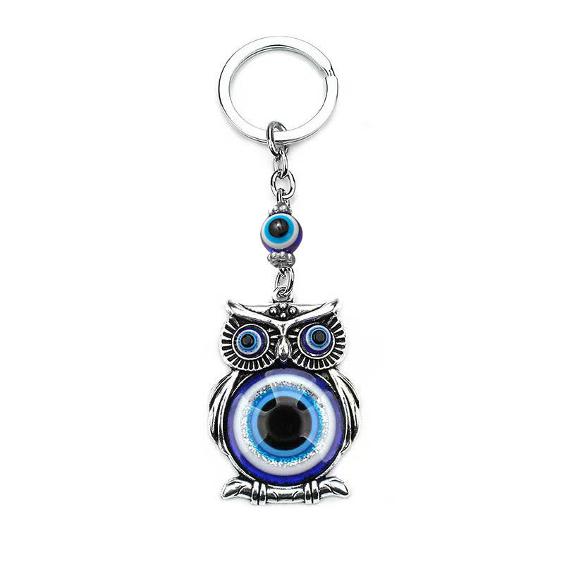 Olivenorma Creative Keychain with Blue Evil Eye & Animal/Plant Details - image 5